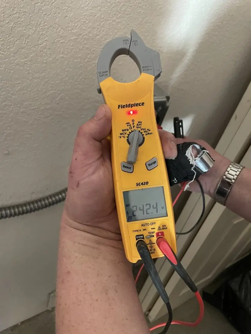 Voltage testing with clamp meter during Aluminum Wiring Replacement in Saline